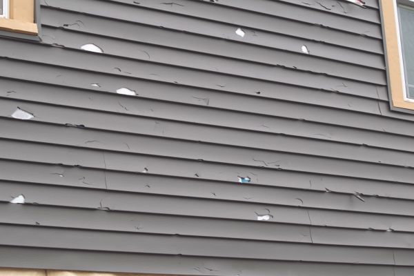 Damaged Siding Replacement in Sherman